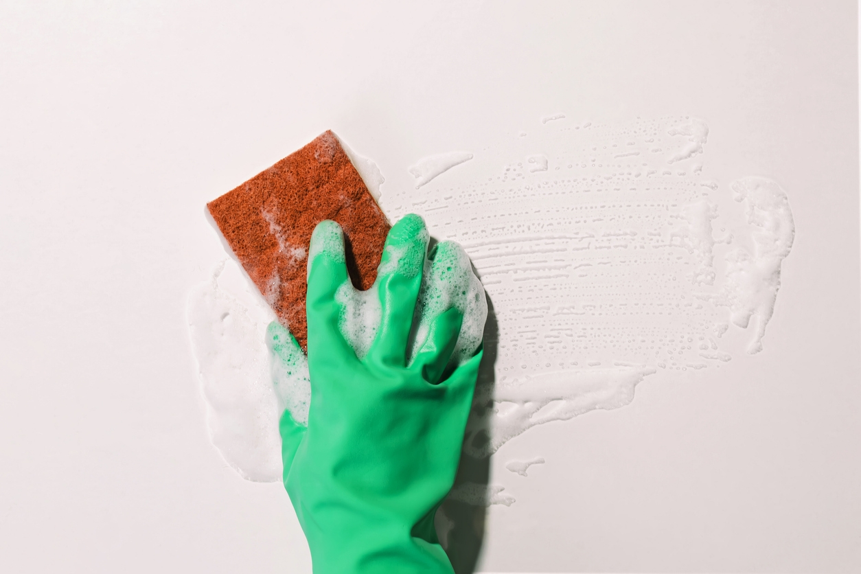 Cleaning a wall in a Sunol, CA business